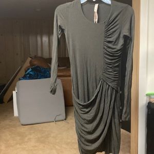 Super dark green. Super soft body on rouched detail.